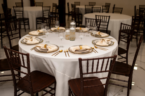 Table and Chairs set up for wedding at The Legacy