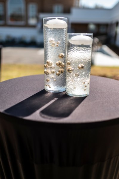 Candle centerpieces outside at the Palm Patio